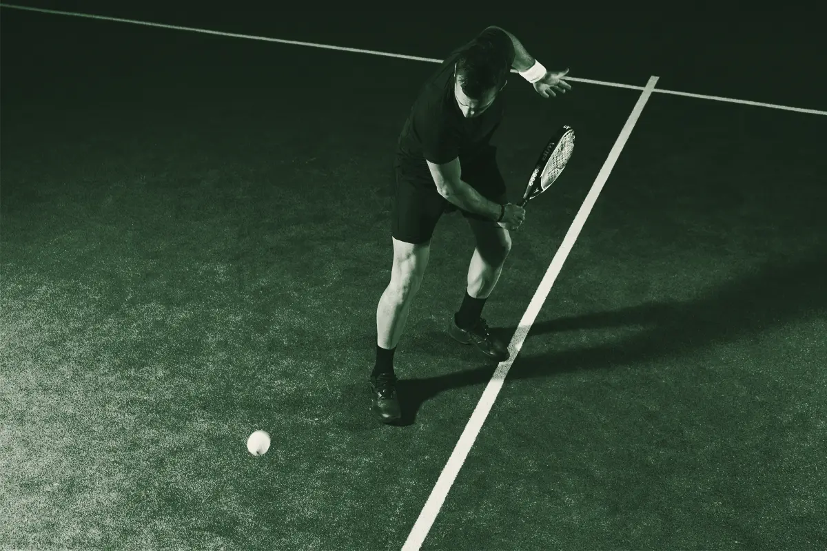 A player stretches for a low ball